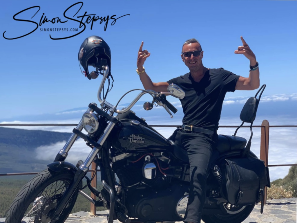 "MindCAPITAL AMBASSADOR Simon Stepsys Riding Harley-Davidson"